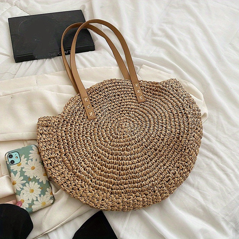 Round bag in braided raffia – Bohemian chic style