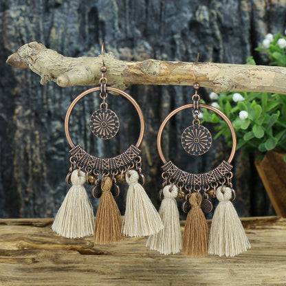 Boucles d'oreilles ponpons
