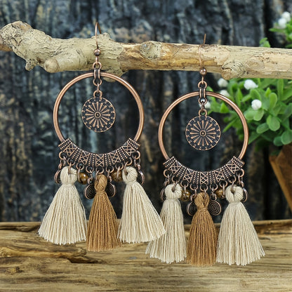 Boucles d'oreilles ponpons