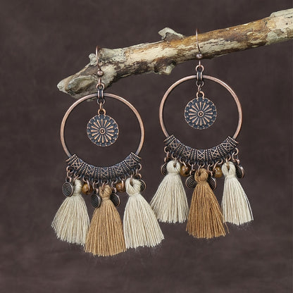 Boucles d'oreilles ponpons