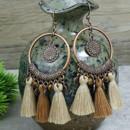 Boucles d'oreilles ponpons