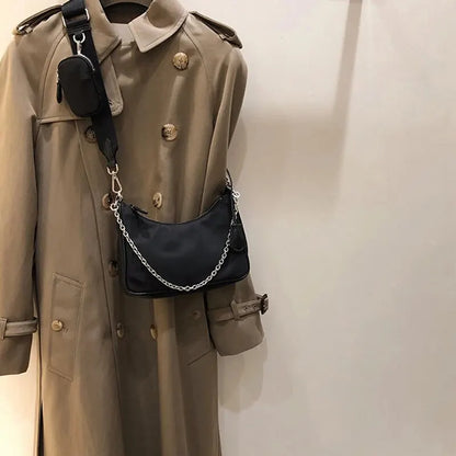Sac à bandoulière avec chaîne et mini pochette imperméable