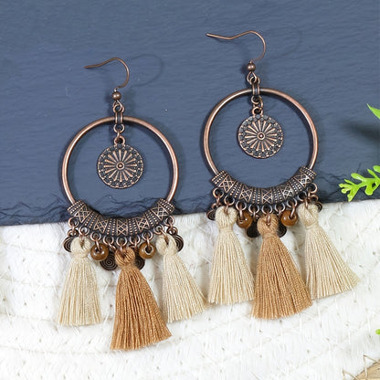 Boucles d'oreilles ponpons